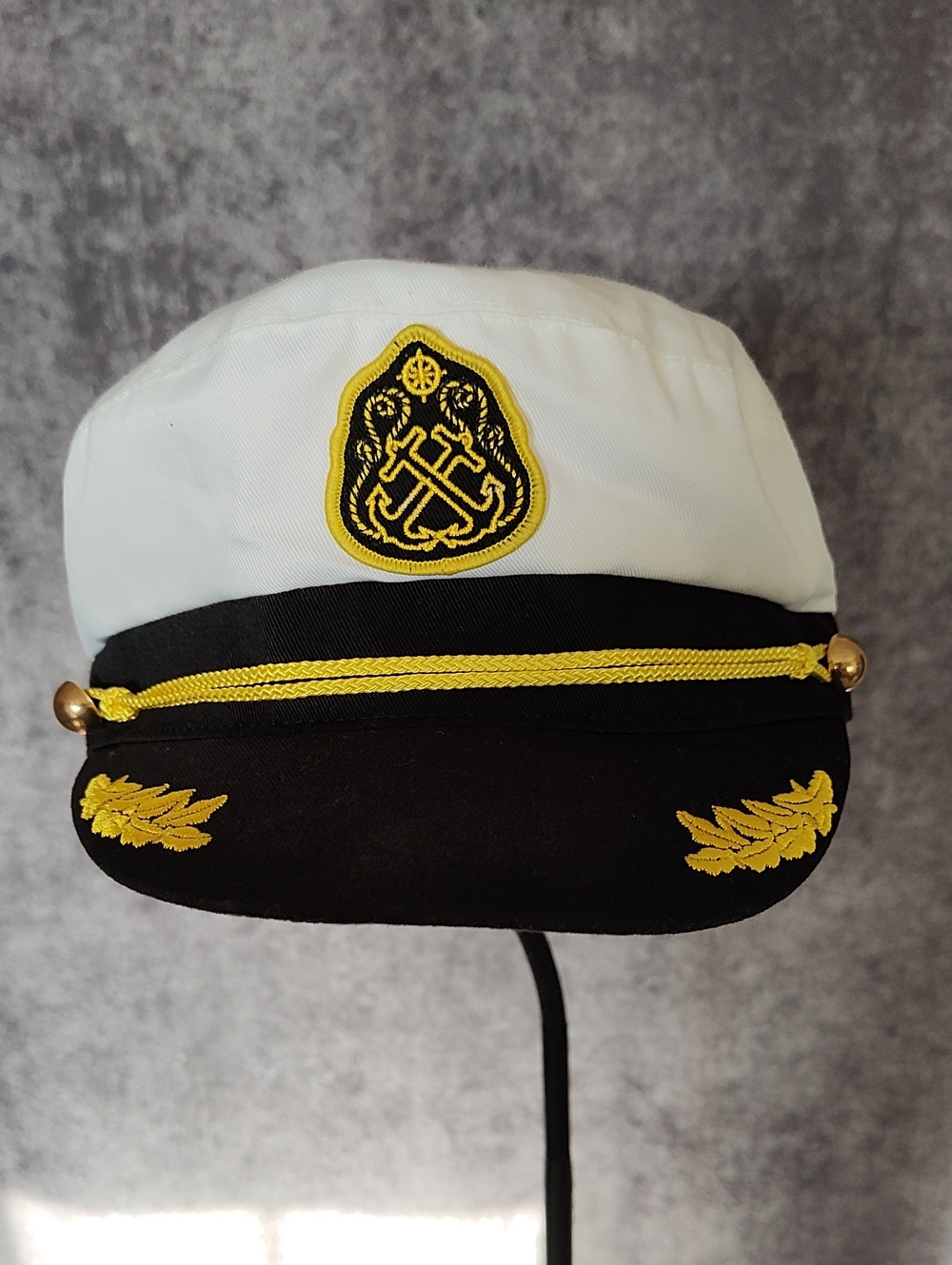 White and Black Captain's Hat with Gold Embroidery